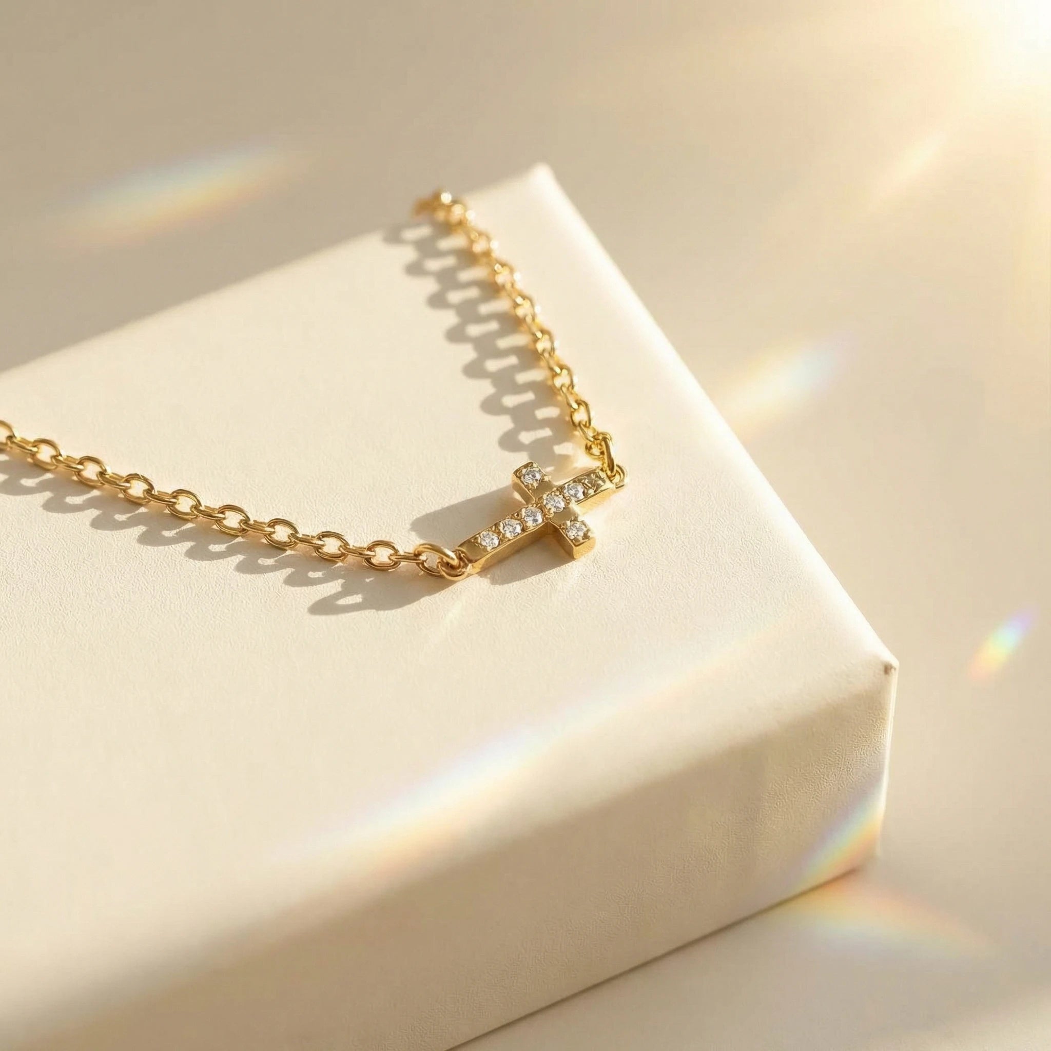 Sideways Cross Bracelet studio image with stone cross detail